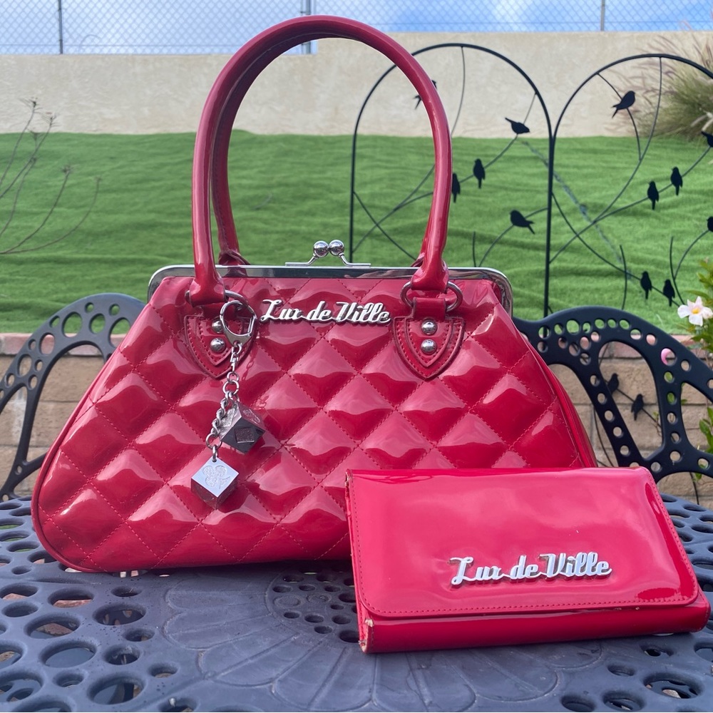 Red Lux de Ville hand bag with matching wallet